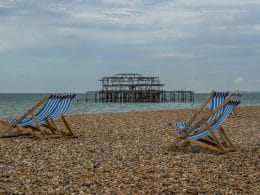 Pebbles and beach chairs after parking at brighton beach.