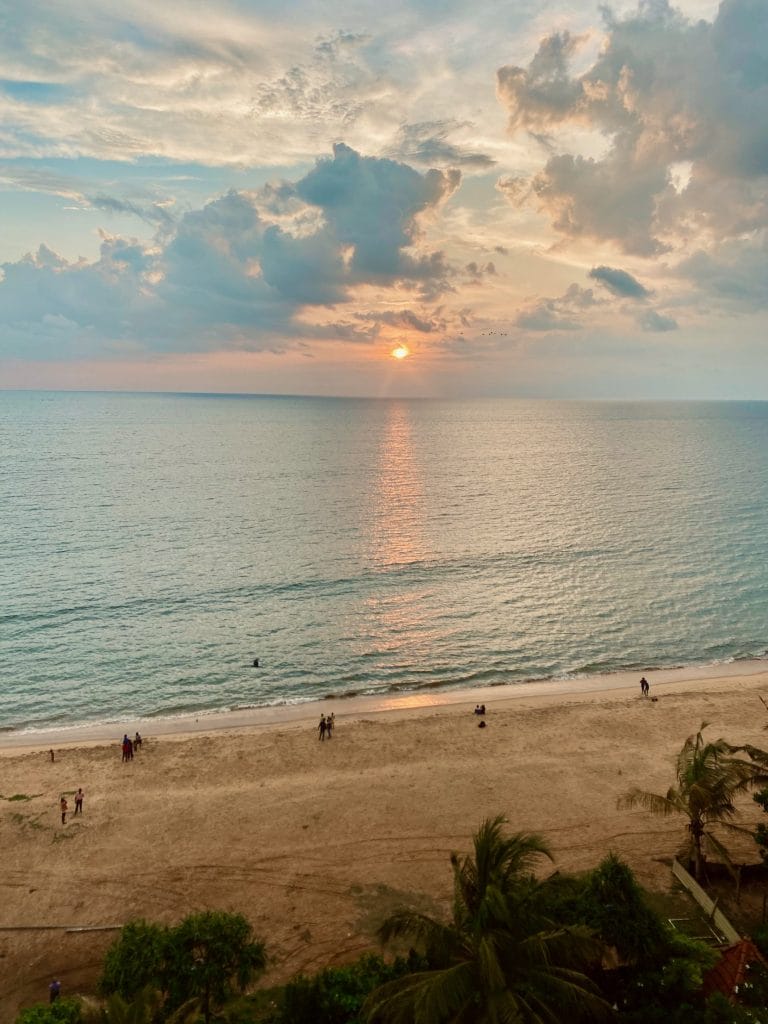 View of sunset over a beach.